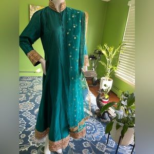 Bottle green indian suit with pajami and dupatta.